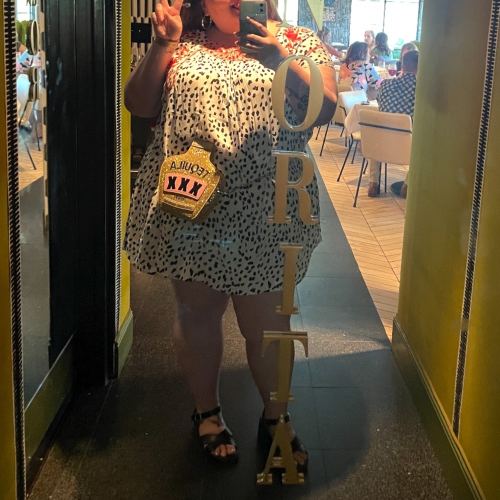 Dalmatian print dress with red design